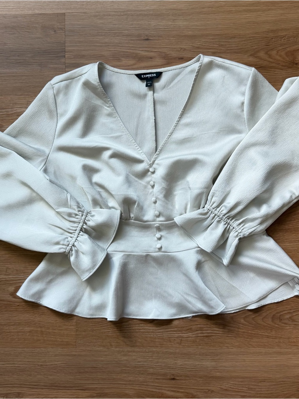 Express Light Cream V-Neck Peplum Blouse